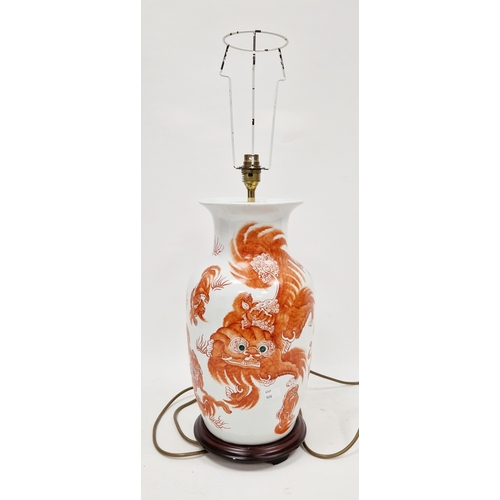 129 - 20th century Chinese oviform vase mounted as a table lamp, decorated in iron red with Dogs of Fo and... 