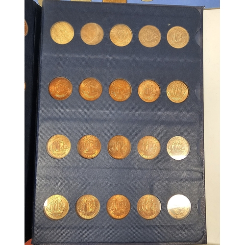 146 - Collection of coins and stamps including three Sandhill coin library albums, one containing half pen... 