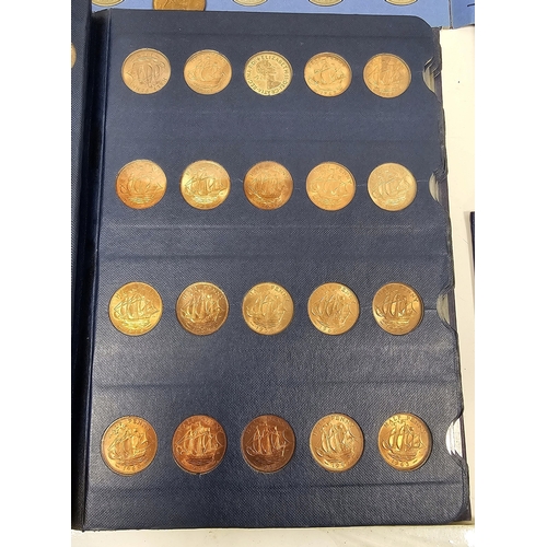 146 - Collection of coins and stamps including three Sandhill coin library albums, one containing half pen... 