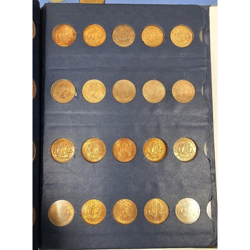 146 - Collection of coins and stamps including three Sandhill coin library albums, one containing half pen... 