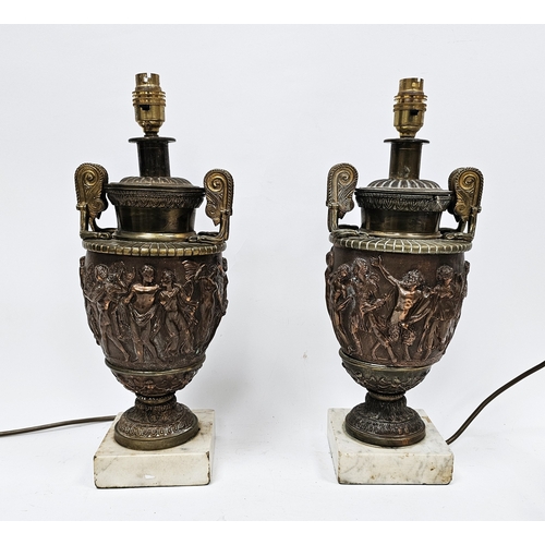 164 - Pair of cast brass and copper table lamps in the style of Townley Vases, the bowl with embossed clas... 