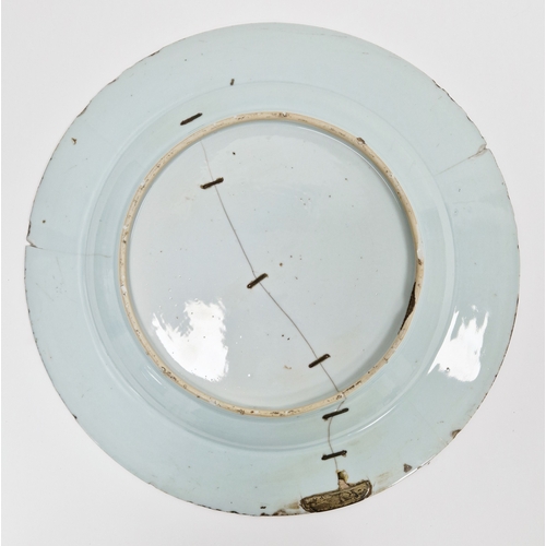 121 - Chinese export famille rose charger, 18th century, painted with a peony and other flowers amongst le... 