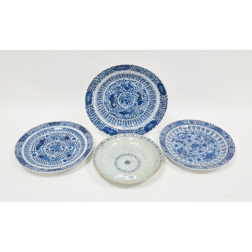 123 - Three Chinese porcelain blue and white 'fishes' plates in the Kangxi style, probably later, with fou... 