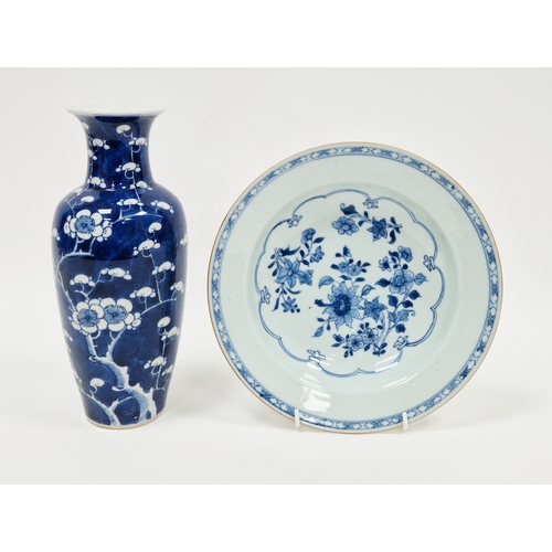 127 - Chinese export porcelain blue and white soup plate, 18th century, painted with flowering shrubs with... 