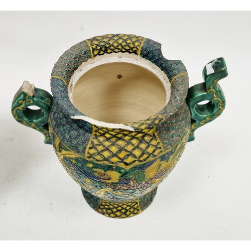 130 - Pair of Japanese late Meiji period (1868-1912) green ground pottery vases and covers, each with red ... 