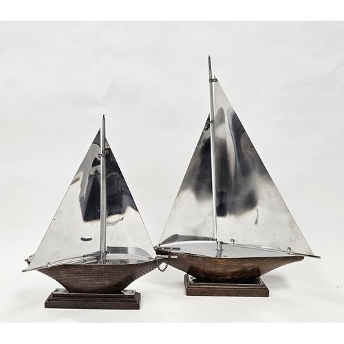 140 - Two polished aluminium and wooden models of sailing boats or yachts, in the Art Deco style. largest ... 
