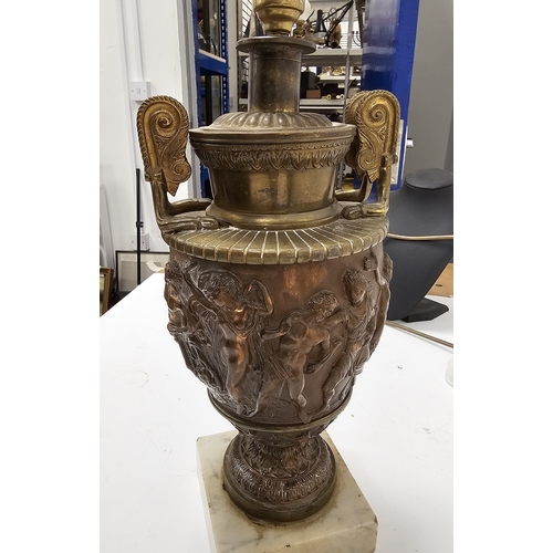 164 - Pair of cast brass and copper table lamps in the style of Townley Vases, the bowl with embossed clas... 