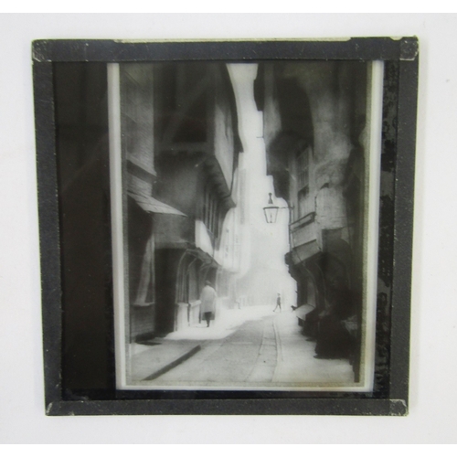 102 - Quantity of early 20th century magic lantern glass slides (3 boxes)