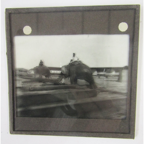 102 - Quantity of early 20th century magic lantern glass slides (3 boxes)