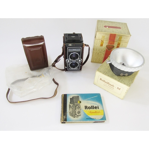 107 - Rollei Magic medium format TLR camera in black, serial no.2502858, in original leather outer casing ... 