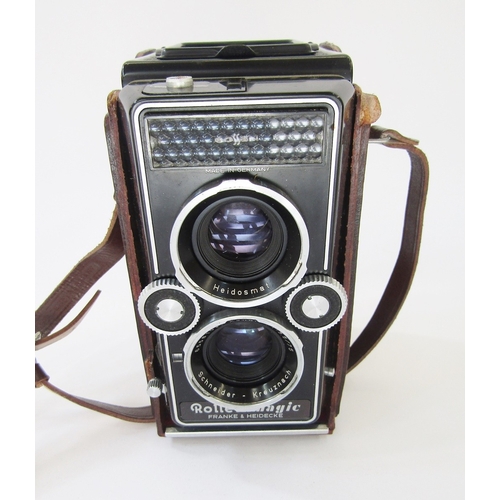 107 - Rollei Magic medium format TLR camera in black, serial no.2502858, in original leather outer casing ... 