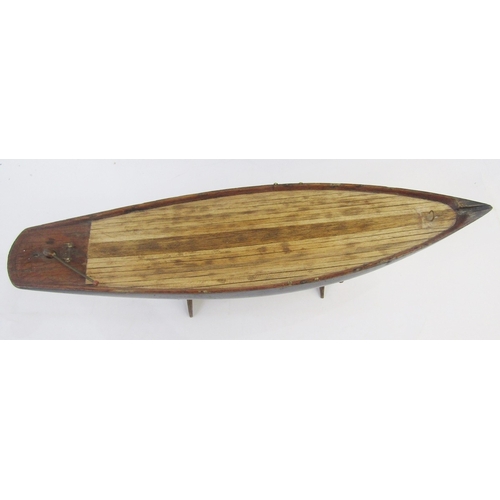 122 - Vintage wooden pond yacht with weighted base and rudder, 56cm long on stained wood stand