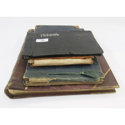 84 - Four albums of early 20th century and later photographs and postcards including 1920's photographs o... 