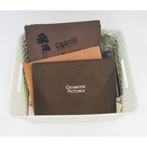 91 - Ephemera and other collectables to include an early 20th century scrap album, postcard album includi... 