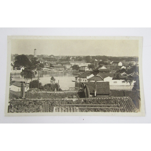 94 - Early 20th century Chinese photograph album containing photographs of topographical interest and sce... 