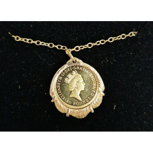 343 - Elizabeth II 1996 Britannia £10 1/10oz gold coin, mounted in a 9ct gold pendant with 9ct gold chain,... 