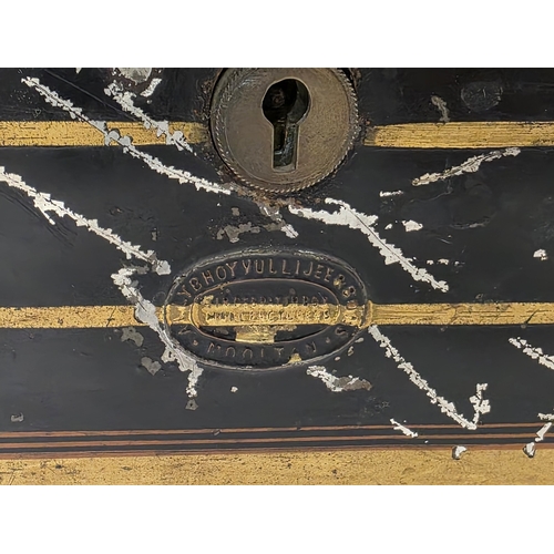 192 - 19th century Anglo-Indian toleware dispatch box marked Allybhoy Vullijee & Sons, Mooltan, 34cm wide