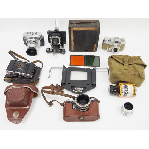 200 - Collection of cameras, field glasses and accessories including a cased Elixa Reflex-A, Audax 120, Vo... 