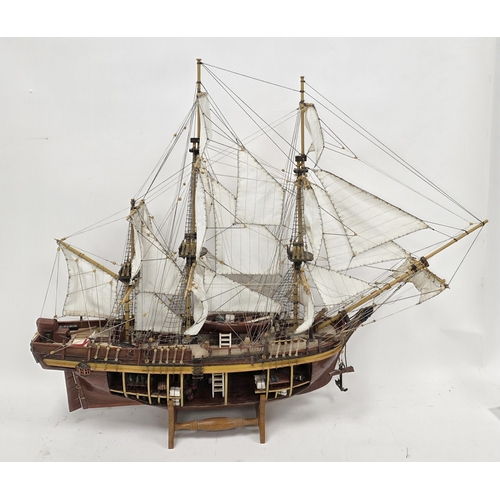 203 - Wooden kit-built model of HMS Bounty, one side of the hull open revealing the inner decks with barre... 