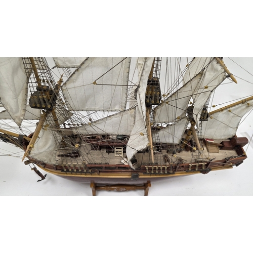 203 - Wooden kit-built model of HMS Bounty, one side of the hull open revealing the inner decks with barre... 