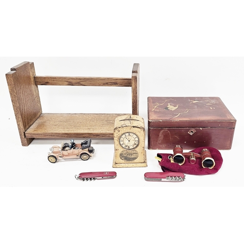 229 - Mauchlinware Newbiggin Beach moneybox in the form of a clock, 11cm high, an Art Deco oak table-top b... 