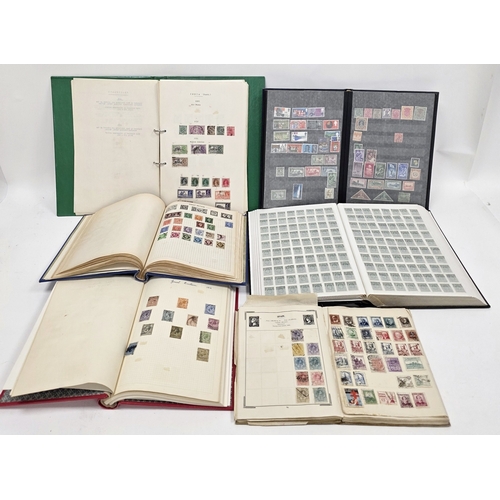 230 - Collection of approximately 21 stamp albums / stock books, mostly partially filled, including an alb... 