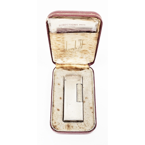 282a - Dunhill silver plated engine-turned cigarette lighter in original fitted case, stamped 'Brit.726982,... 