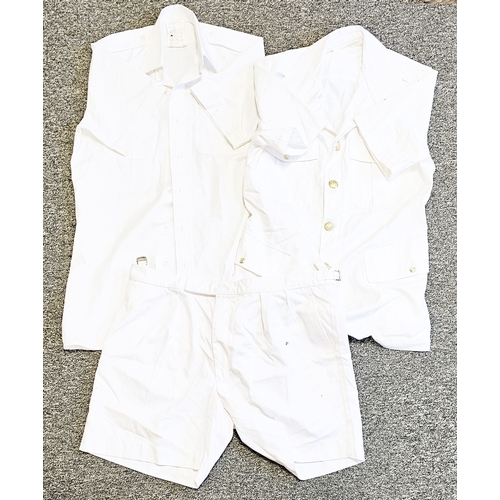 691 - 12 pairs of Royal Navy white shorts, a Royal Navy white bush officer's jacket and a pair of white st... 