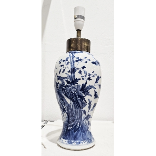 107 - Chinese porcelain blue and white inverted baluster vase adapted as a lamp, painted with an exotic bi... 