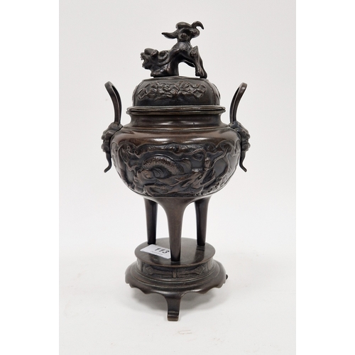 113 - Japanese Meiji period (1868-1912) bronze tripod censor on stand, pierced cover surmounted with a lio... 