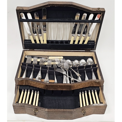 254 - George Butler & Co. (Sheffield) stainless steel and ivorine initialled oak canteen of cutlery, all i... 