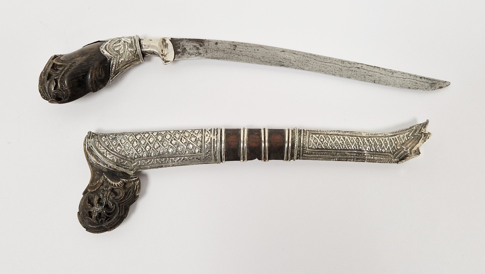 Indonesian Sewar dagger with slightly curved blade and the hilt and ...