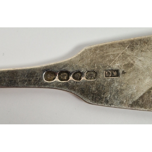292 - George III silver fiddle pattern tablespoon, monogrammed (some wear) and a George IV silver table fo... 