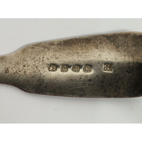 292 - George III silver fiddle pattern tablespoon, monogrammed (some wear) and a George IV silver table fo... 