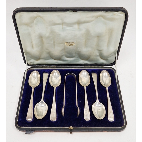 309 - Set of six silver feather-edged teaspoons and a pair of matching sugar tongs by Josiah Williams & Co... 