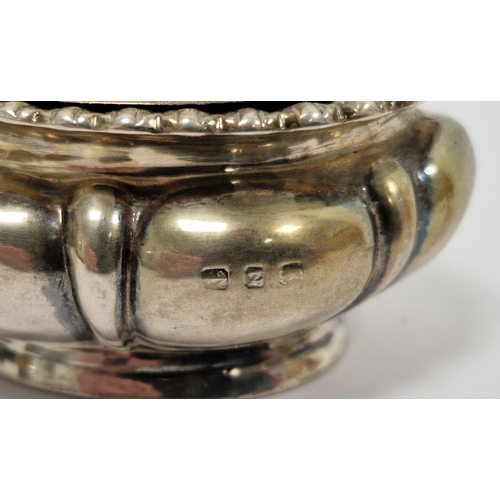 316 - Victorian silver mustard pot, gadrooned, with glass liner, hallmarked Birmingham, 1899; an Edwardian... 