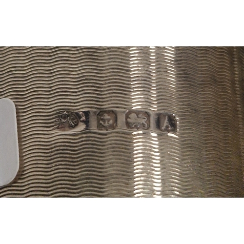 330 - Silver cigarette case of curved rectangular form with engine-turned decoration, 4.5ozt approx, a cir... 