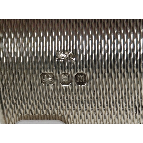 330 - Silver cigarette case of curved rectangular form with engine-turned decoration, 4.5ozt approx, a cir... 