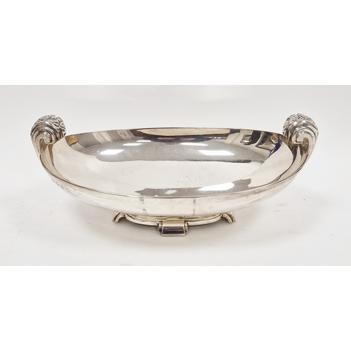 334 - George V silver Art Deco silver bowl, crescent-shaped, twin handled, on four shaped feet, hallmarked... 