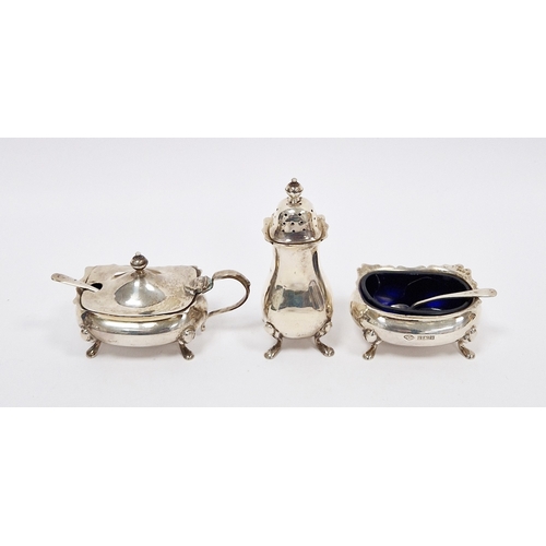 341 - Silver condiments, comprising: a salt, blue glass liner & spoon, a mustard pot, glass liner and spoo... 