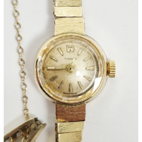 356 - Lady's Tissot 9ct gold bracelet watch, the circular dial with baton markers and the textured bracele... 