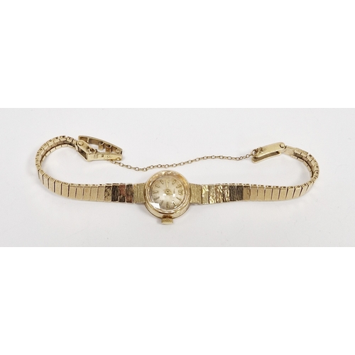 356 - Lady's Tissot 9ct gold bracelet watch, the circular dial with baton markers and the textured bracele... 