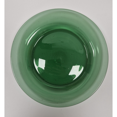 69 - Group of green tinted glassware including a footed bowl, a decanter and two stoppers, five candlesti... 