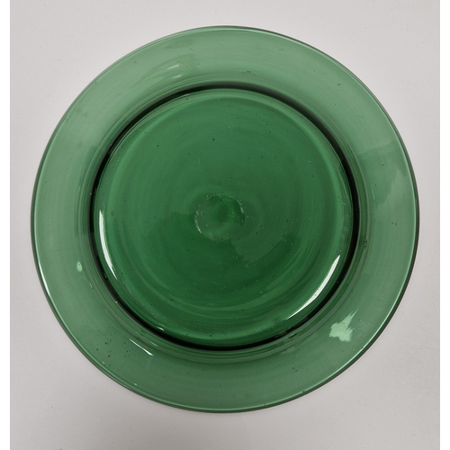 69 - Group of green tinted glassware including a footed bowl, a decanter and two stoppers, five candlesti... 