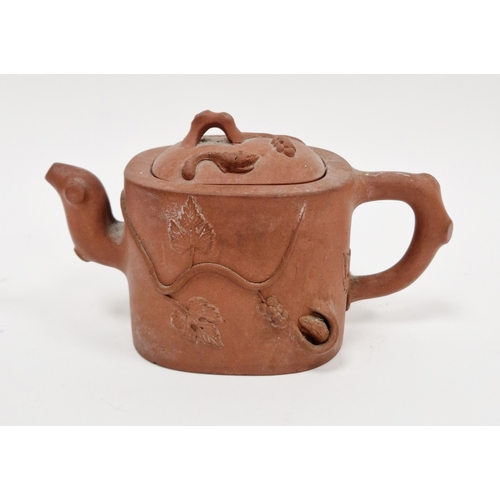 89 - 19th century Chinese Yixing teapot and cover with branch moulded spout and handle, moulded in high r... 