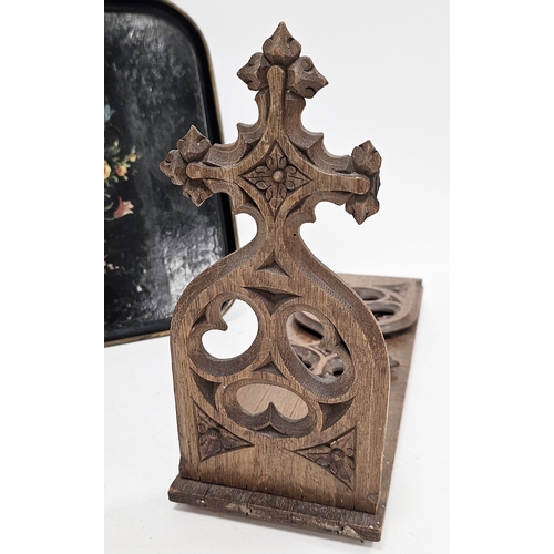 109 - Late 19th/early 20th century oak book slide, the folding ends carved in a gothic ecclesiastical mann... 