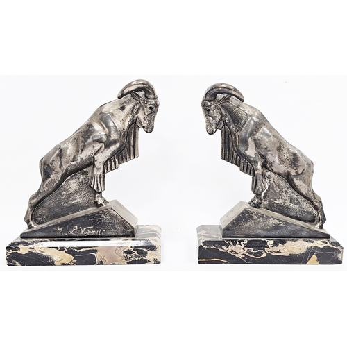 118 - After Max Le Verrier a pair of Art Deco-style bookends in the form of spelter mountain goats on marb... 