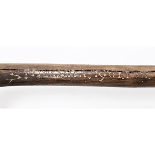 119 - Boar War prisoner of war walking stick, the handle carved in the form of a seals head and etched to ... 