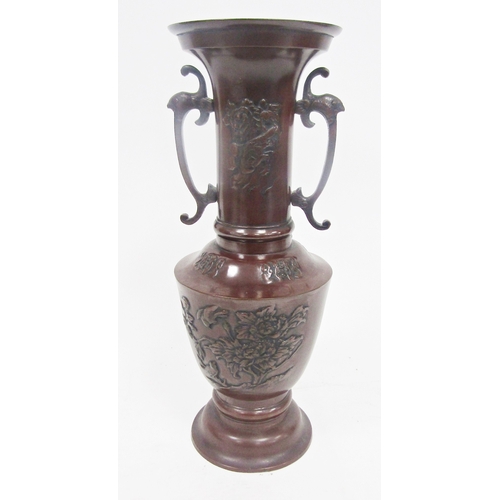 124 - Japanese cast metal baluster vase with a bronzed finish, the twin handles in the form of dragons, wi... 