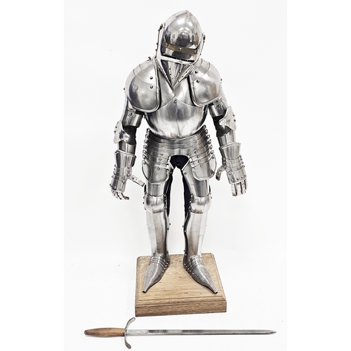 140 - Vintage miniature model of a 15th century Gothic style suit of armour, mounted on a fabric covered m... 